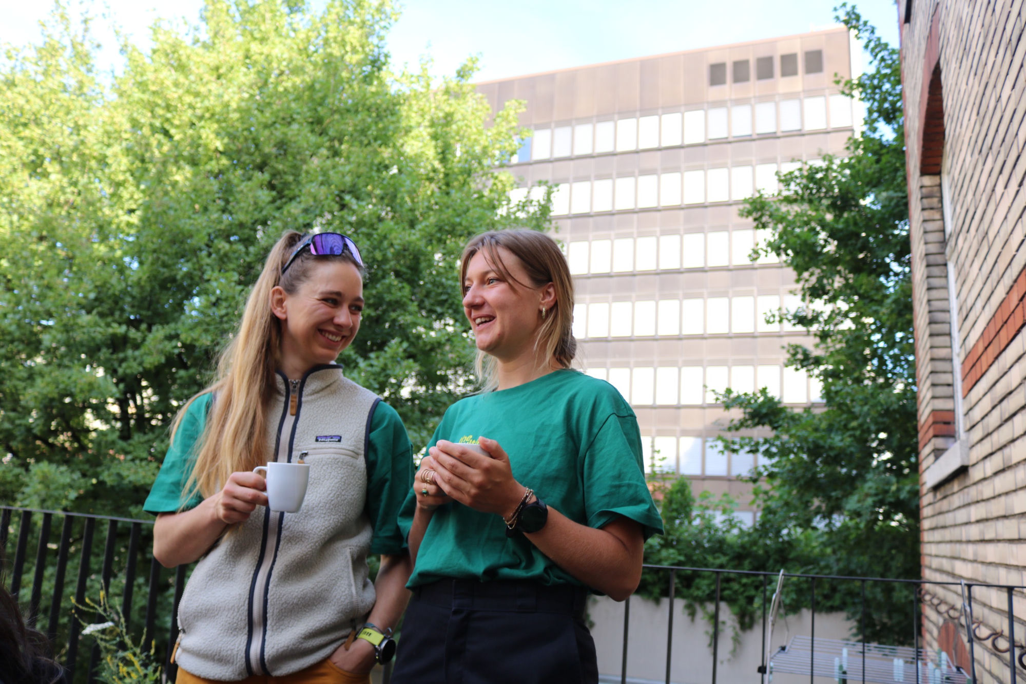 Josien and Ronja in conversation, wearing The Culture Trail shirts