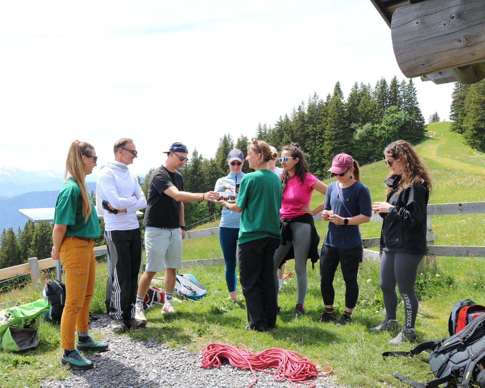 The group working together as a team on the trail, with the climbing rope
